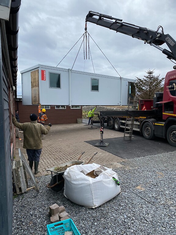 The Scrapstore expansion building being lifted into place