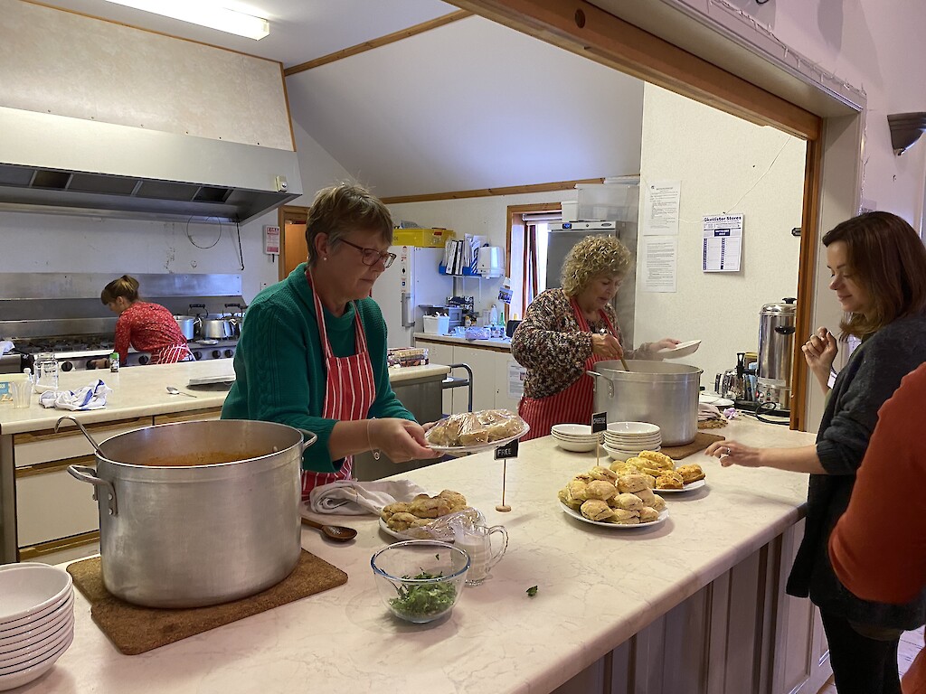 Preparing refreshments for the visiting community groups