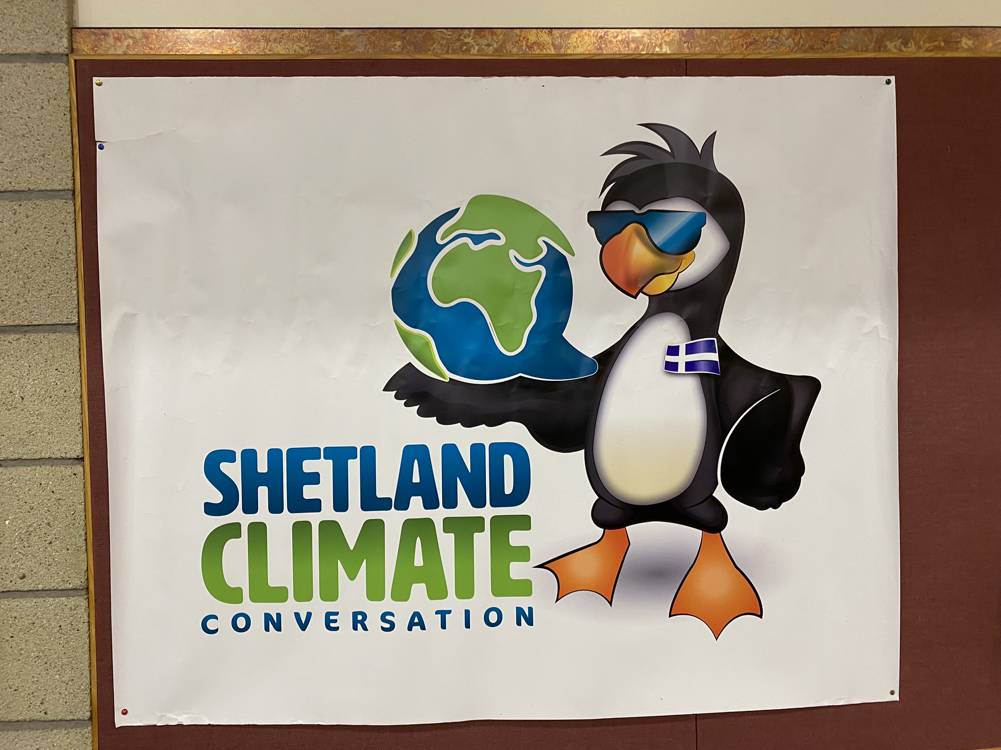 Shetland Climate Conversation display featuring the climate puffin